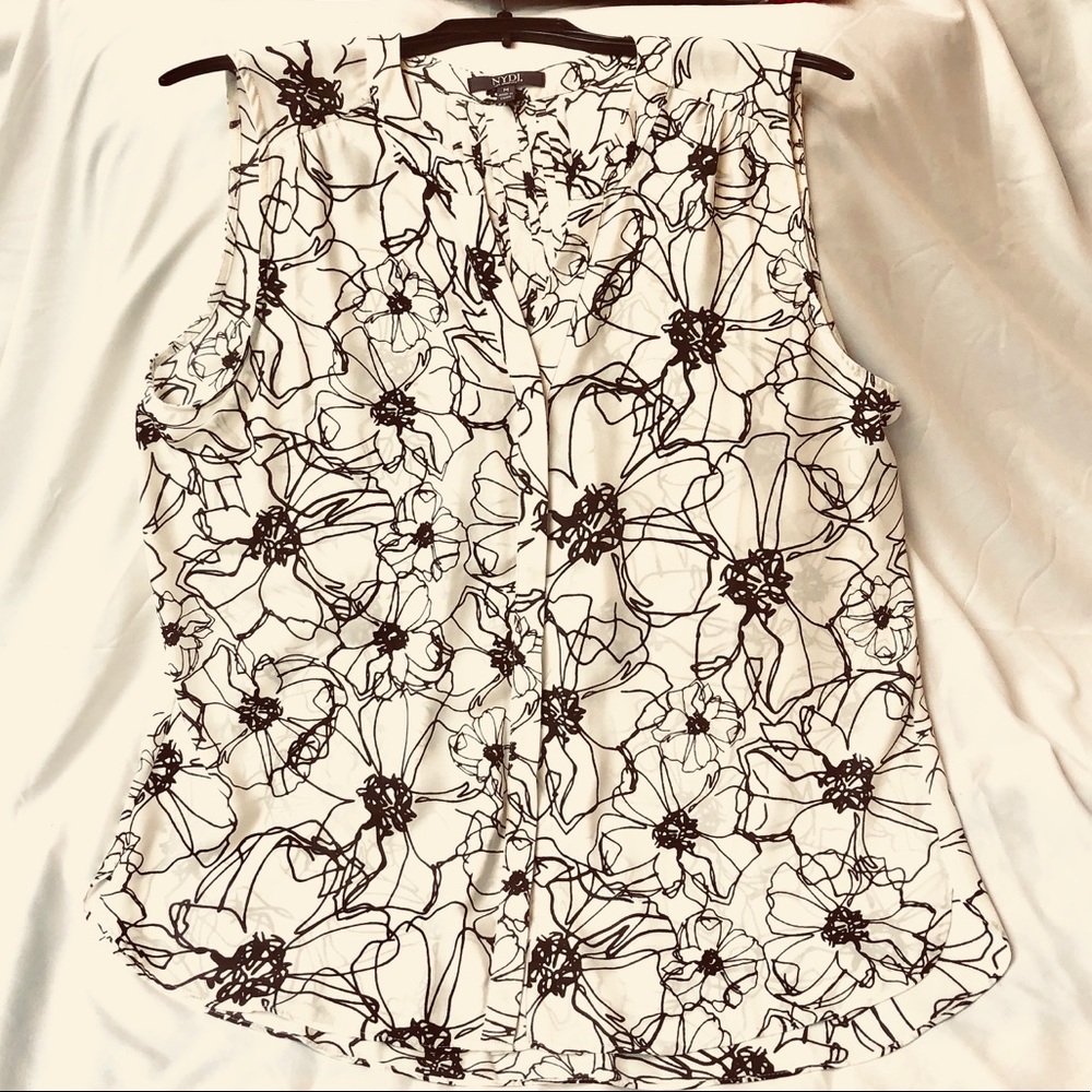 Never worn, but tags removed, sleeveless floral